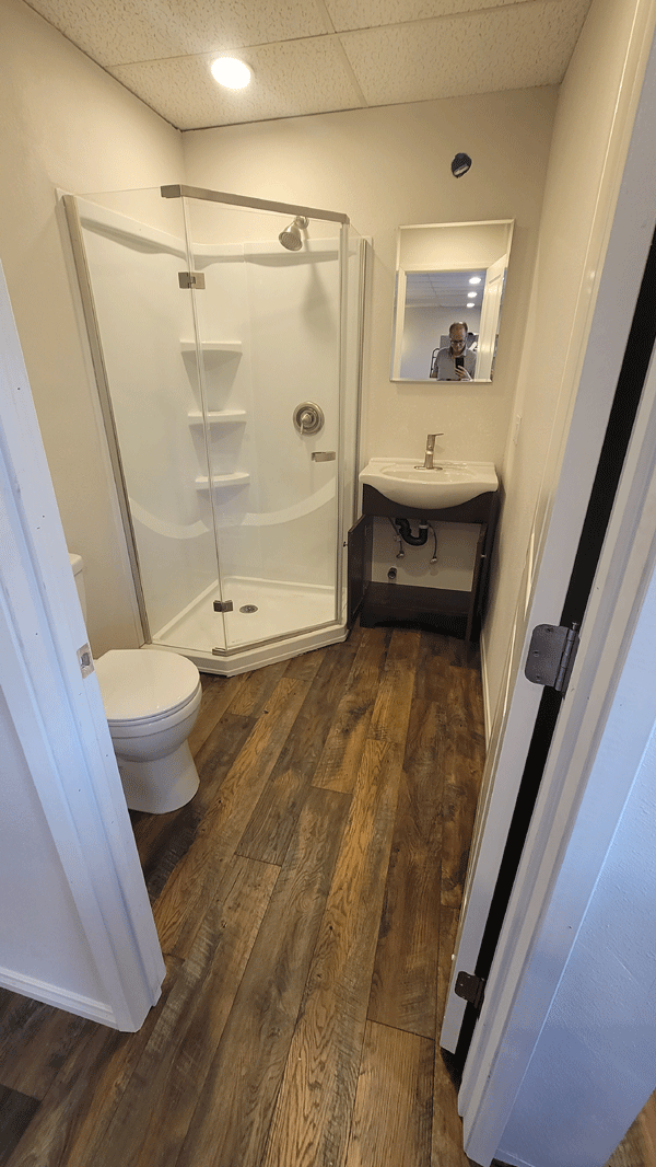 new bathroom in an office trailer conversion