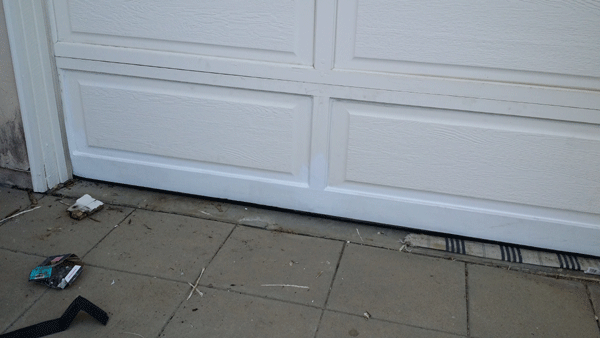 Garage door after rot repair